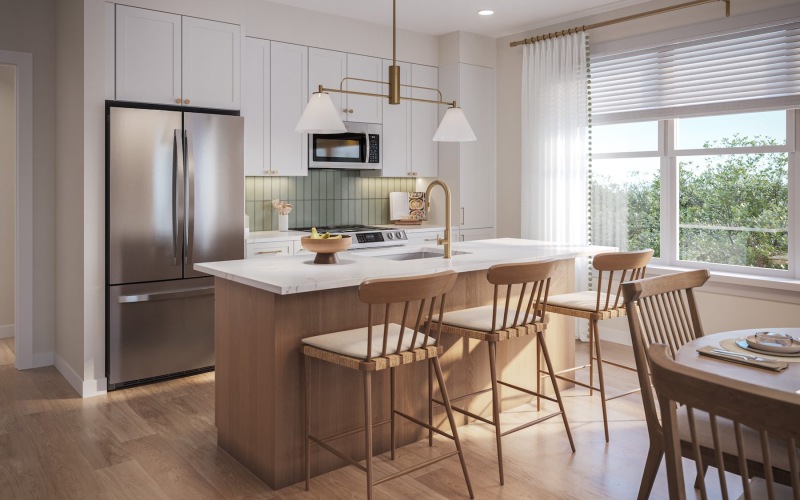 a kitchen with a table and chairs