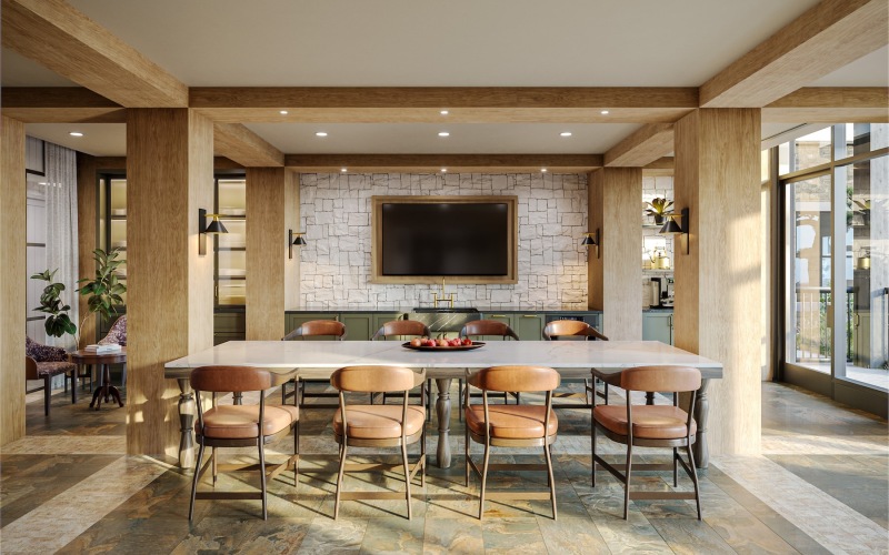 a community kitchen with a large table and chairs